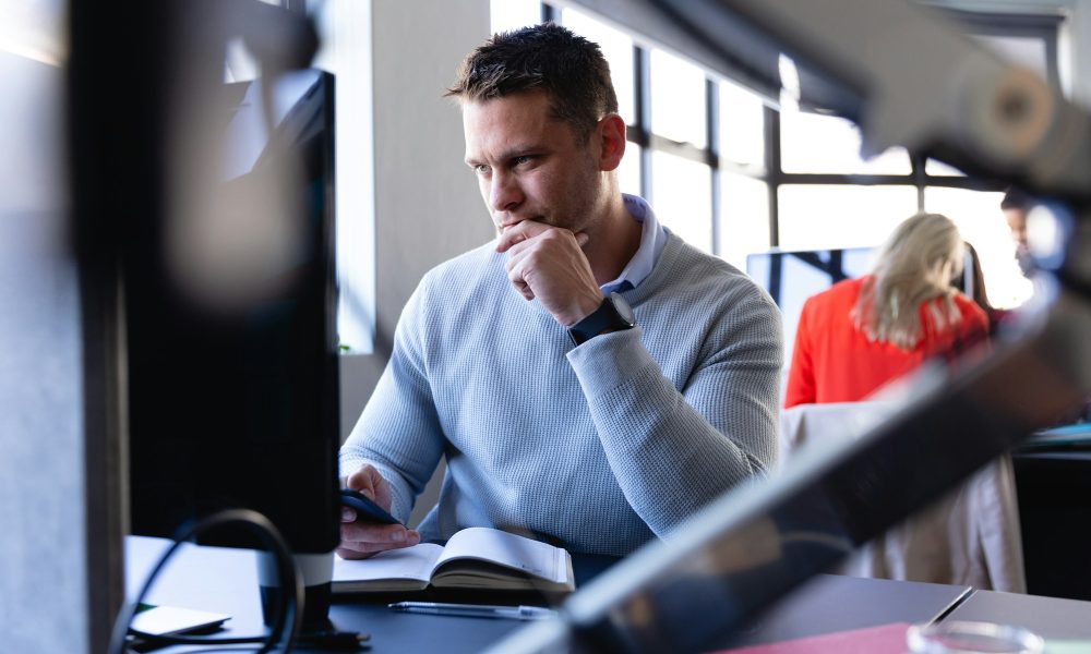 Caucasian man working in office