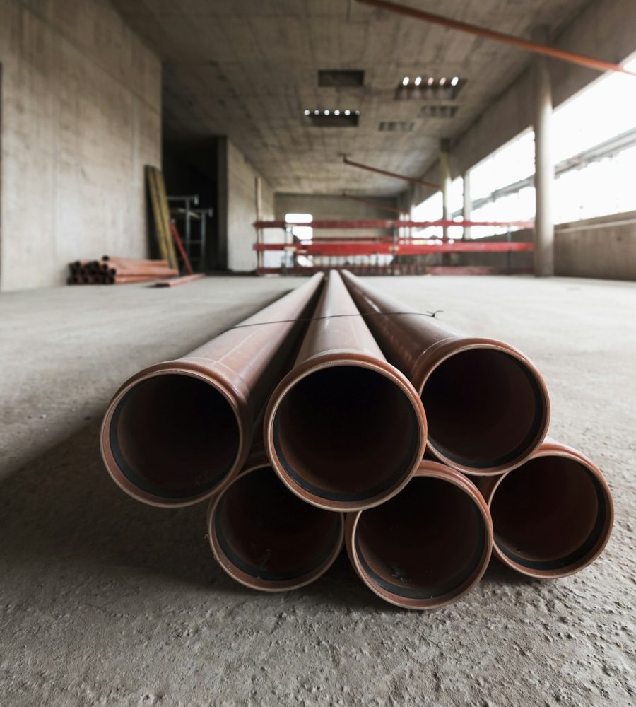 Pipes in an unfinished building under construction